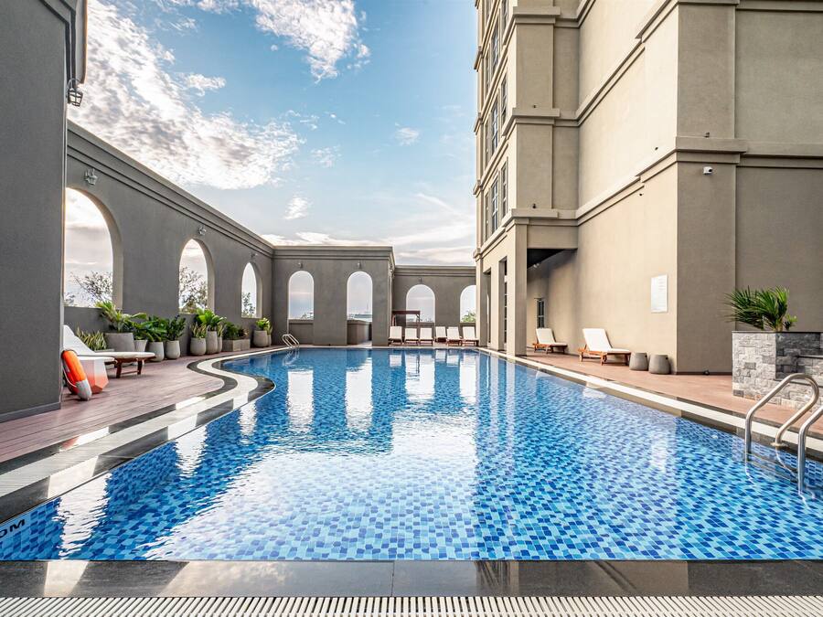 Outdoor pool, open 6:00 AM to 7:00 PM, pool umbrellas, pool loungers