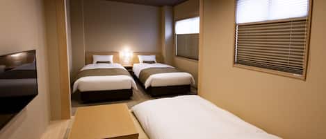 Habitación económica con 2 camas individuales (Tatami) | Edredón, escritorio, wifi gratis y ropa de cama
