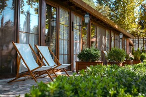 Deluxe Room, Terrace, Garden View | Property grounds