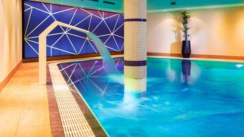 Indoor pool, open 7:00 AM to 8:00 PM, pool loungers