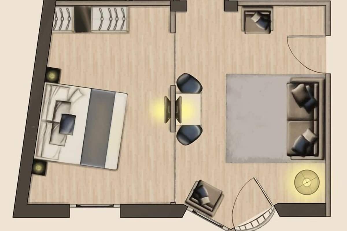 Planta de um apartamento de dois quartos, com sala de estar, cozinha e dois quartos.