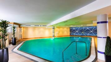 Indoor pool, open 7:00 AM to 8:00 PM, pool loungers