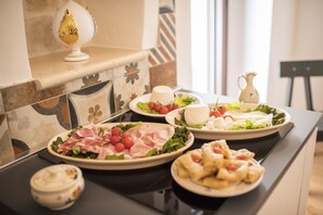 Dagelijks ontbijtbuffet inbegrepen