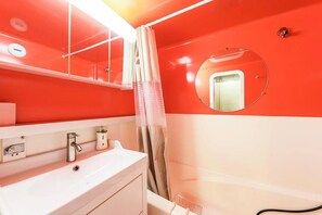 Combined shower/tub, hair dryer, towels, soap