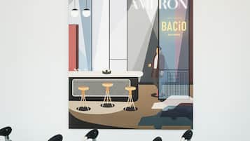 A poster of a bar with stools and a counter, and three shopping carts with the brand name AMERON.