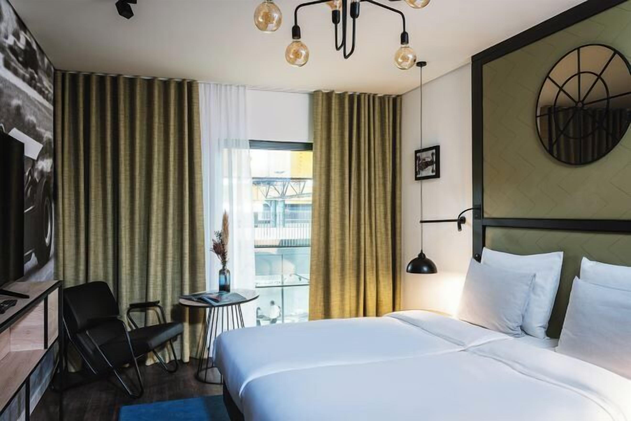 Premium bedding, down duvets, in-room safe, laptop workspace