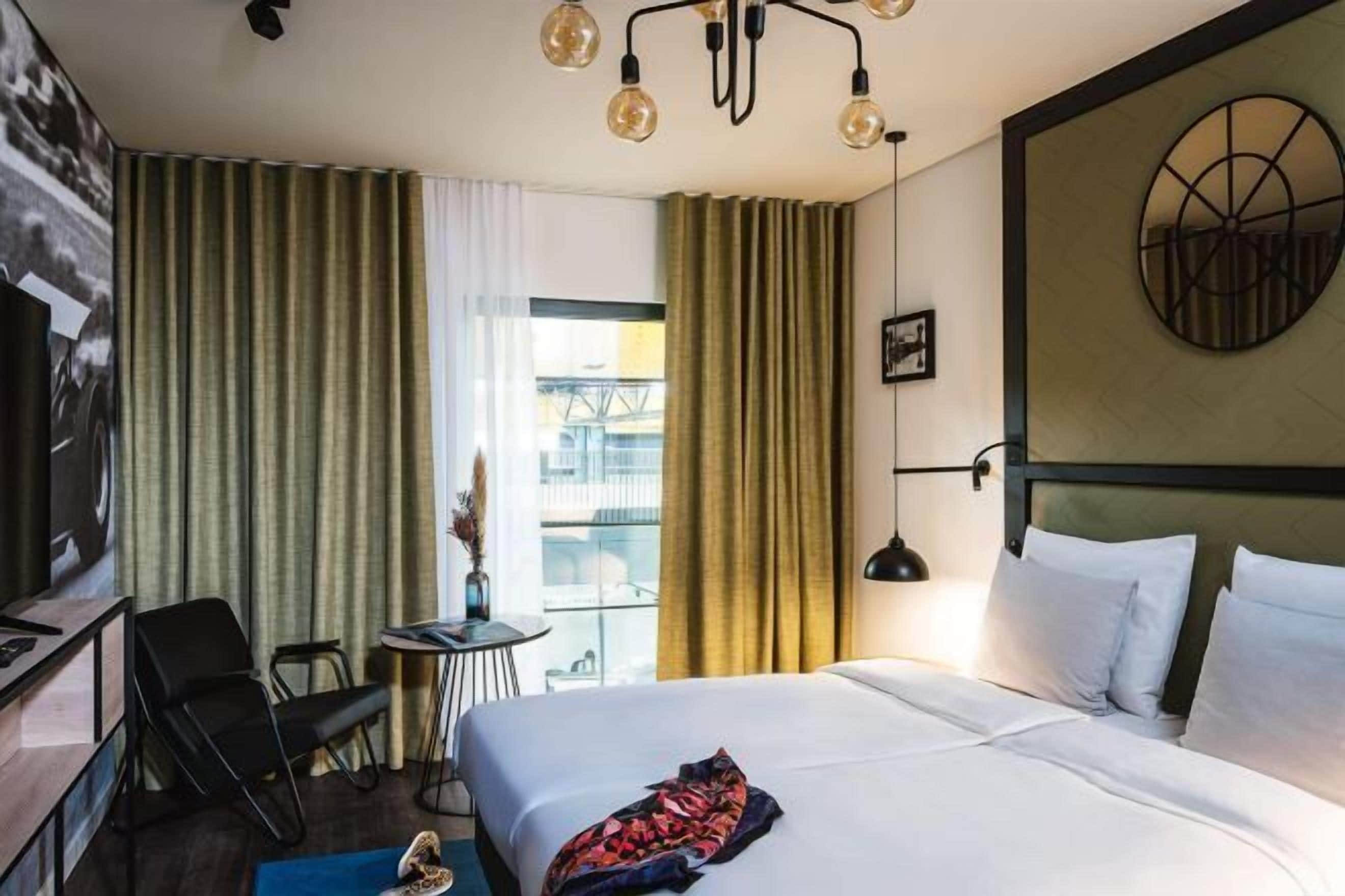 Premium bedding, down duvets, in-room safe, laptop workspace