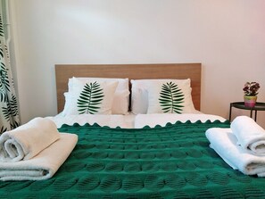 1 habitación, tabla de planchar con plancha, wifi gratis y ropa de cama 