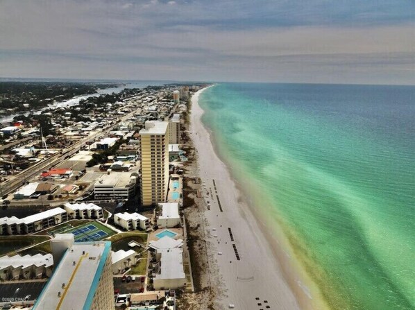 On the beach, sun loungers, beach towels
