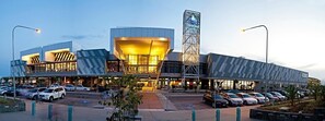 Stunning building with a central atrium and unique vertical structure.