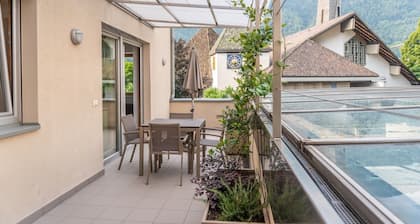 Vacation apartment with very large sun-drenched terrace + garage near Merano
