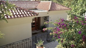 A small building with a tiled roof and a balcony with a railing. - Olive Grove Villa, private pool & whirl pool, total privacy (Marmaris)