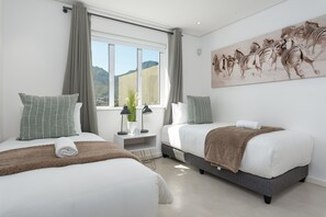 2 bedrooms, in-room safe, iron/ironing board, internet