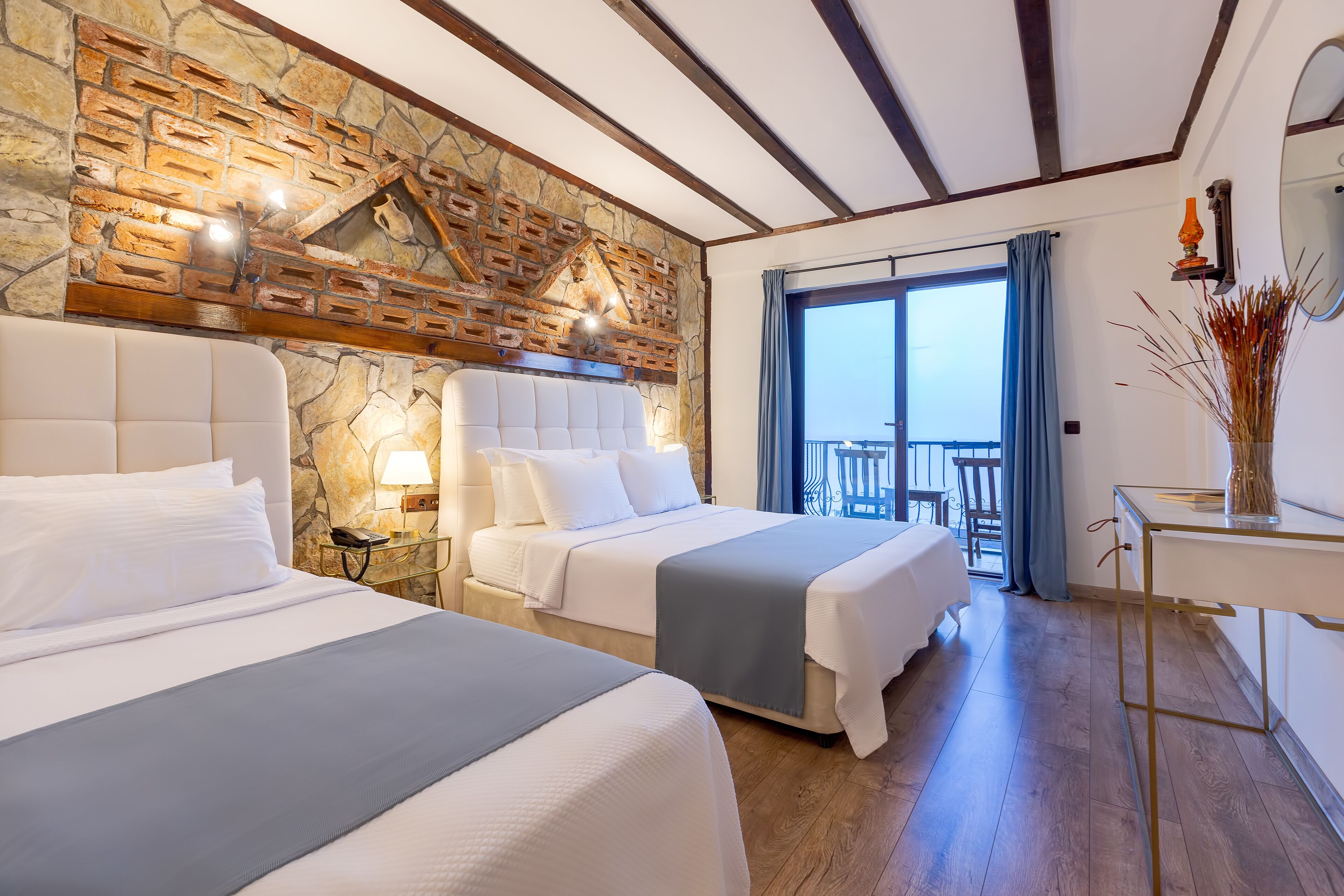 Habitación triple, vistas al mar | Vistas desde la habitación