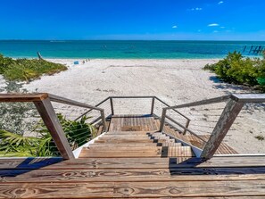 On the beach, sun-loungers, beach towels