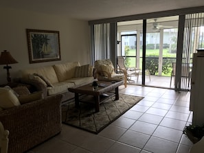 TV, books - 2-Bedroom Condo Steps to Beach, Pools, and Golf (Fort Pierce)