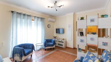 Appartement Premium, 2 chambres | Coin séjour | Télévision à écran plat