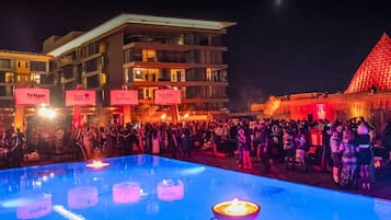 Outdoor pool, a heated pool, sun loungers