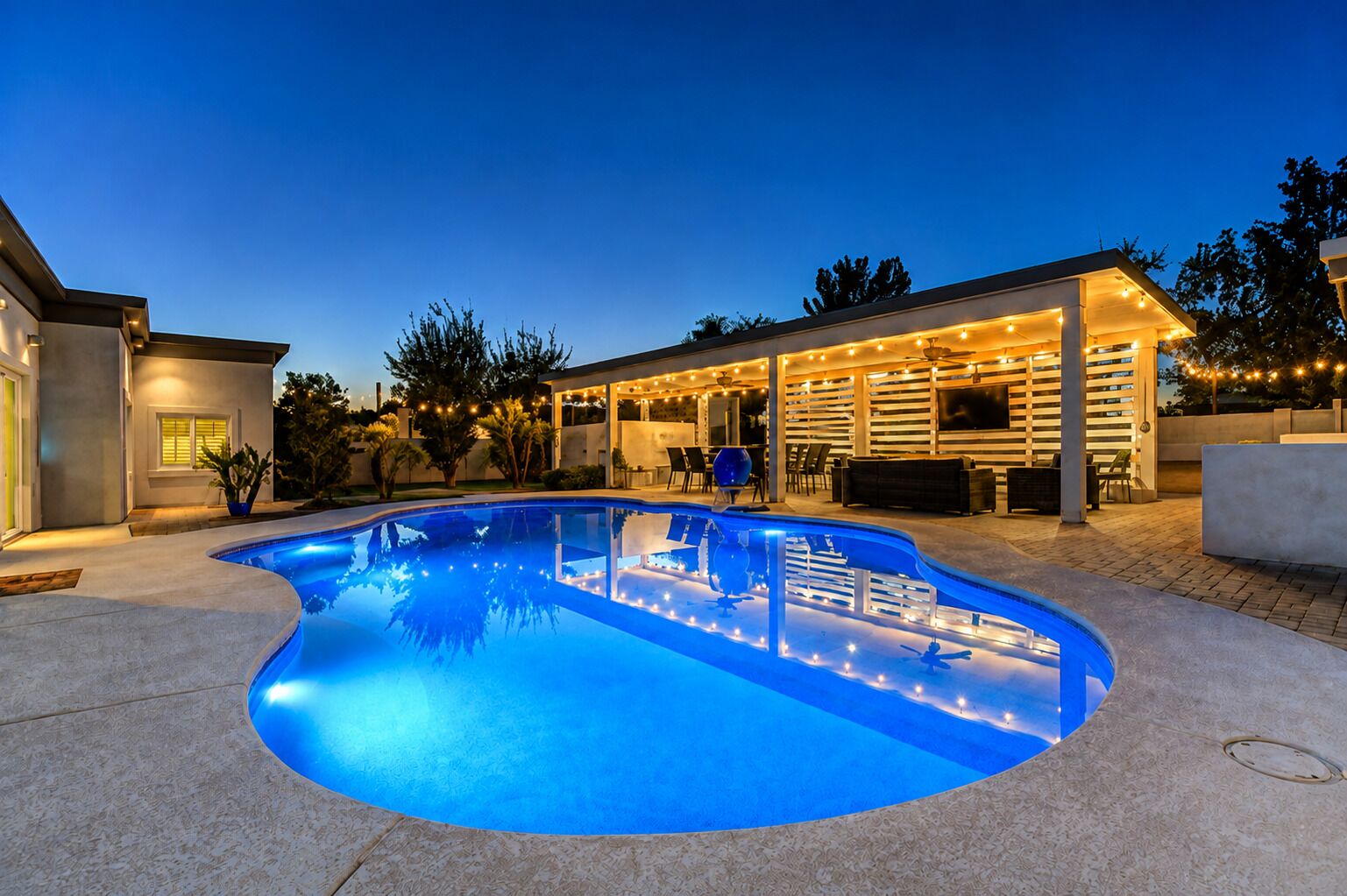 Outdoor pool, a heated pool, sun loungers