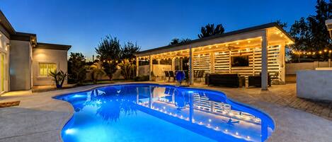 Outdoor pool, a heated pool, sun loungers