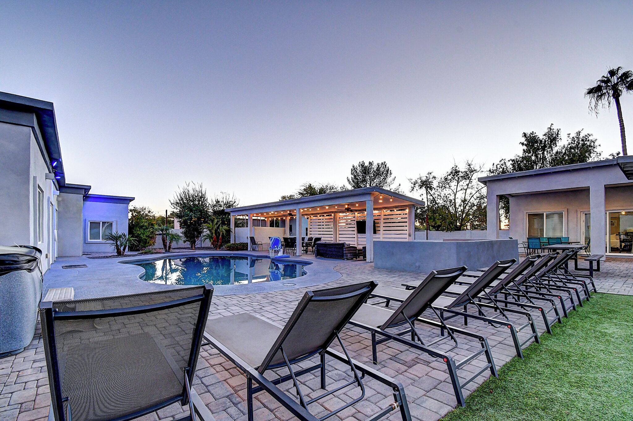 Outdoor pool, a heated pool, pool loungers