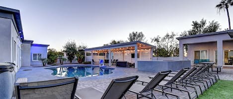 Outdoor pool, a heated pool, sun loungers