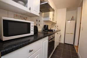 Microwave, oven, stovetop, coffee/tea maker