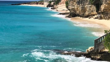 On the beach, sun loungers, beach towels