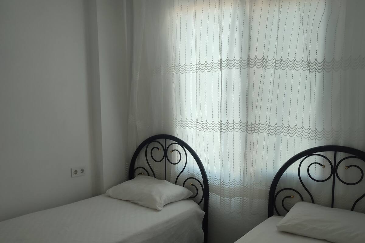 Familienapartment, 1 Schlafzimmer | 1 Schlafzimmer, hochwertige Bettwaren, individuell dekoriert