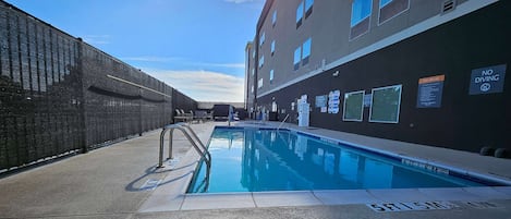 Seasonal outdoor pool, pool loungers