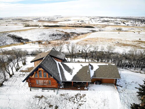 Three level  Log  Home on Private 40 Acre Estate.