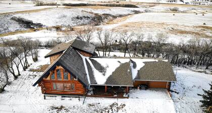 Three level Log Home on Private 40 Acre Estate.