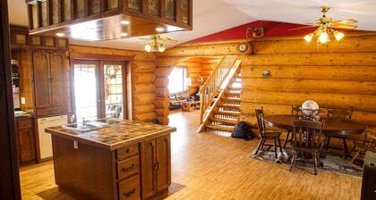 Three level Log Home on Private 40 Acre Estate.