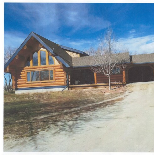 Three level  Log  Home on Private 40 Acre Estate.