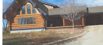 Three level Log Home on Private 40 Acre Estate.