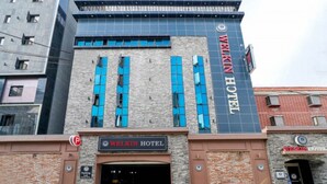 A hotel building with a sign reading "WELKIN HOTEL". - Daeyeon Welkin Hotel (Busan)