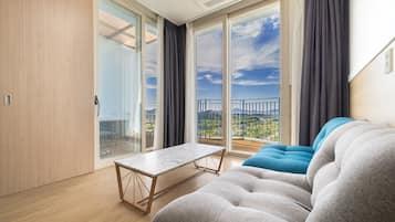 Premier Spa Suite Deluxe King (Half Ocean View) (Private Spa Tub Unavailable in Winter (Nov - Mar)) | Living area | 42-inch LED TV with satellite channels, TV, pay movies