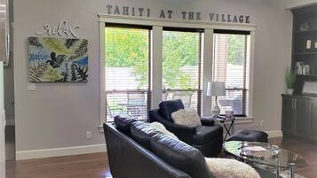 Smart TV, fireplace, books, offices