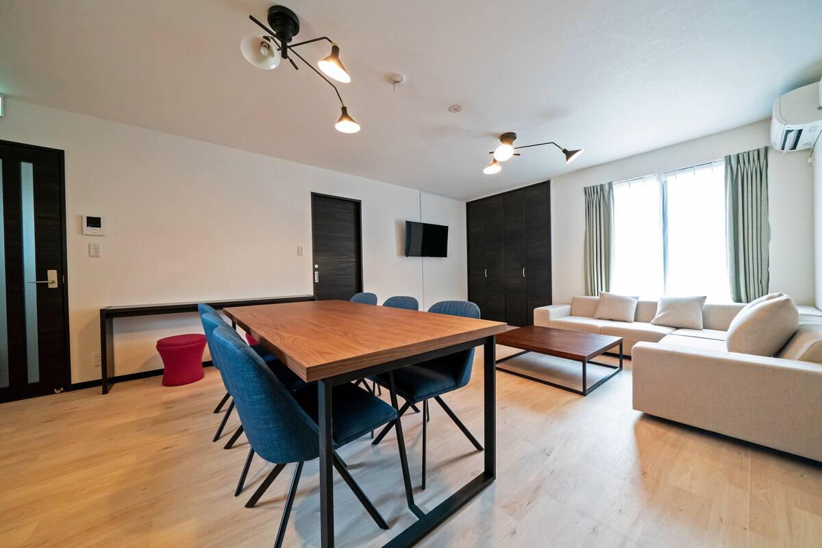 Family Apartment, 3 Bedrooms | Desk, laptop workspace, free WiFi, bed sheets
