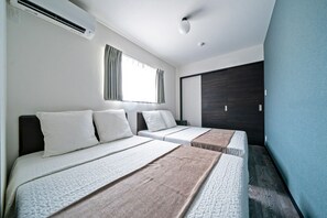 Appartement familial, 3 chambres | Bureau, espace de travail pour ordinateurs portables