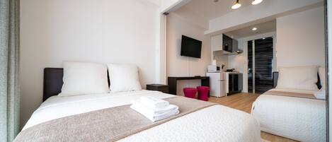 Apartamento básico, 1 quarto | 1 quarto, escrivaninha, espaço de trabalho para notebook