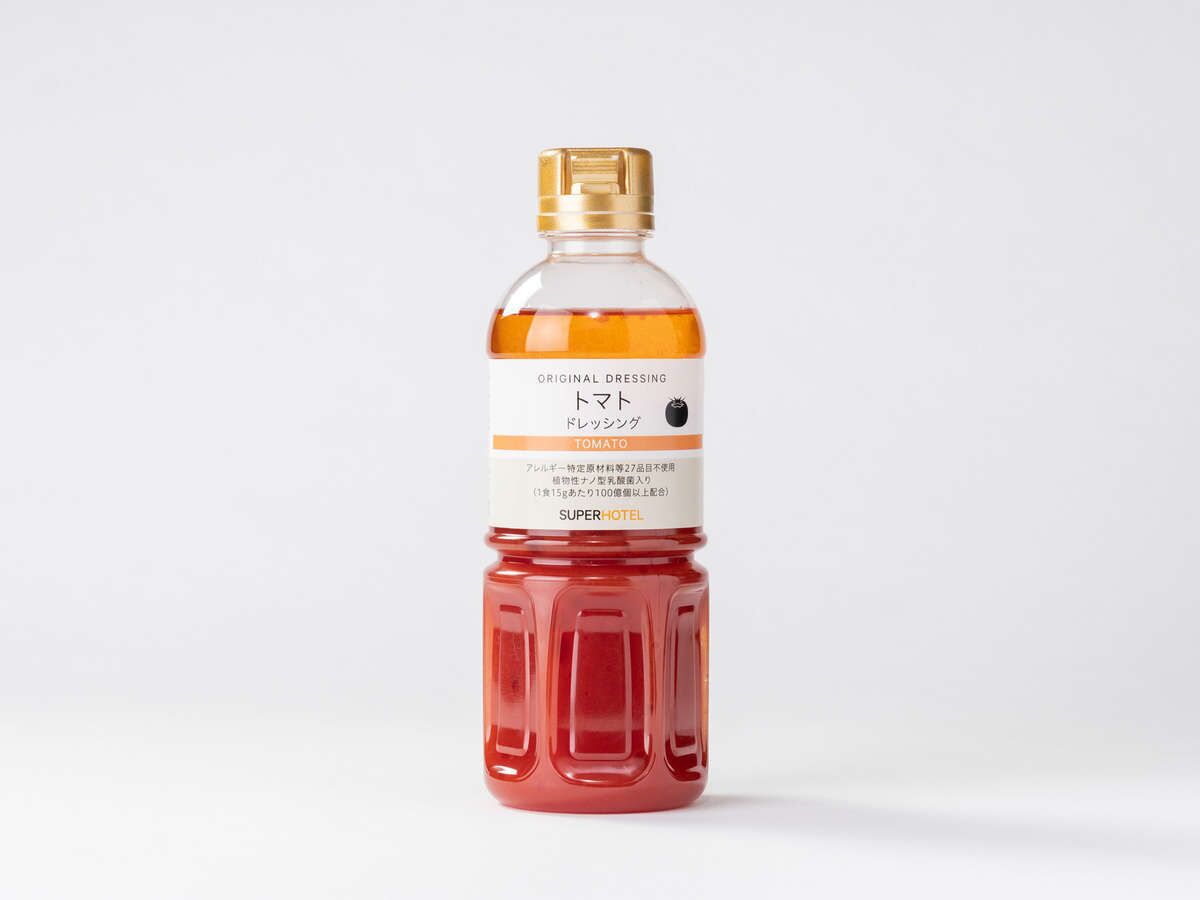 A bottle of Original Dressing with a label indicating it is a tomato dressing.