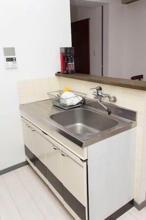 Apartemen Keluarga, 2 kamar tidur | Dapur pribadi | Lemari es, microwave, kompor, dan ketel listrik