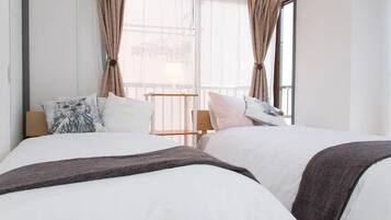 Family Apartment, 2 Bedrooms | 2 bedrooms, desk, laptop workspace, free WiFi