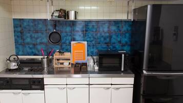 Family Apartment, 2 Bedrooms | Private kitchen | Fridge, microwave, stovetop, electric kettle