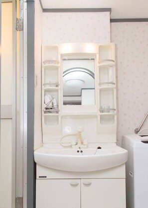 Family Apartment, 2 Bedrooms | Bathroom | Separate bathtub and shower, free toiletries, hair dryer, slippers