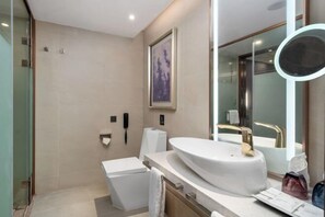 A modern bathroom with a large sink, a mirror, and a shower. - Lavande Hotel (Guilin Longsheng) (Longsheng)