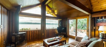 Charming waterfront home with full kitchen, furnished deck, & incredible views