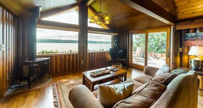 Charming waterfront home with full kitchen, furnished deck, & incredible views