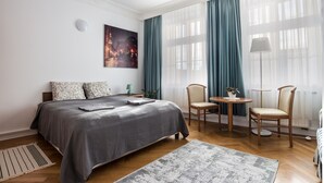 Habitación cuádruple familiar, baño compartido (Stockholm) | Ropa de cama hipoalergénica y cortinas blackout